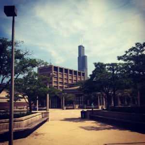 the sears tower looms beyond the brutalist campus of the university of illinois chicago, where the summer institute on sustainability and energy (SISE) takes place.