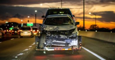 wrecked-car-crash-accident-highway-towing-trailer-freeway